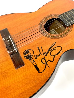 Lot 322 - Signed PAUL Young, with a Cornwall Coliseum concert poster.