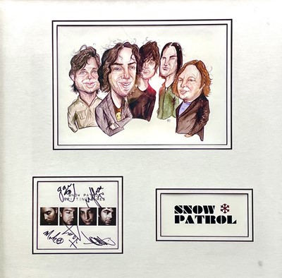Lot 70 - SNOW PATROL. Signed album cover mounted with a print and bands logo.