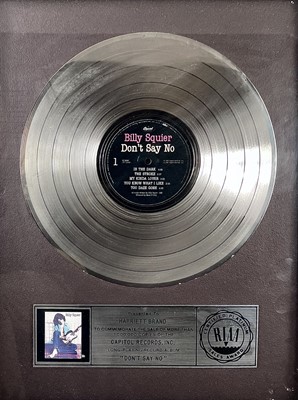 Lot 60 - A RIAA platinum disc awarded to 'Billy Squier'.