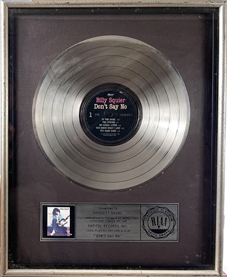 Lot 60 - A RIAA platinum disc awarded to 'Billy Squier'.