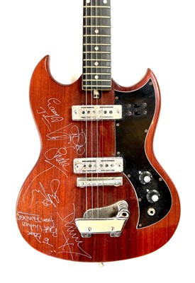 Lot 324 - A signed 'Thunder' guitar and an An original 'Thunder' concert poster.