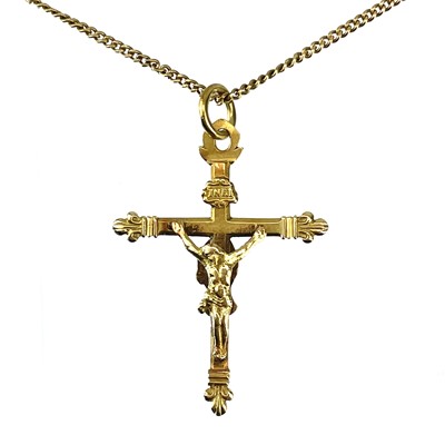 Lot 189 - A continental high purity gold (tests 18ct) double sided crucifix.