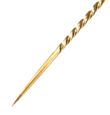 Lot 125 - A Russian 14ct gold stick pin with 56 standard mark.