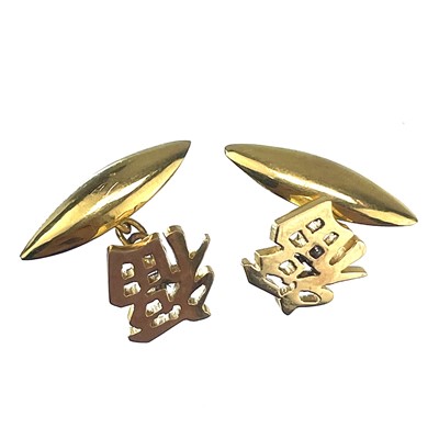 Lot 232 - A pair of Chinese gold Fu cufflinks.