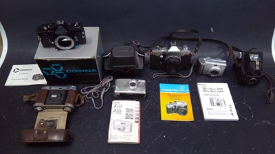 Lot 39 - A selection of SLR Cameras, Lenses and...