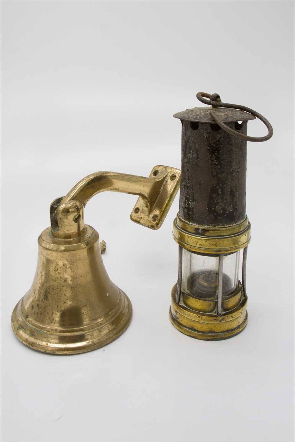 Lot 271 - A brass and iron Davey lamp and a heavy brass...