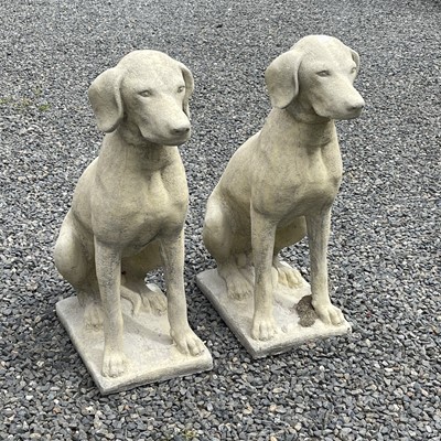 Lot 610 - A pair of reconstituted church stone models of...