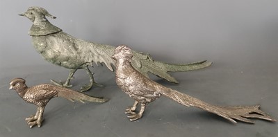 Lot 26 - Three metal pheasant figures, the height of...