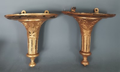 Lot 40 - A pair of antique carved giltwood wall...