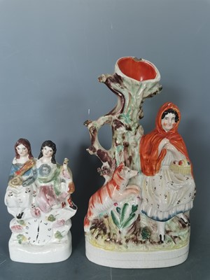 Lot 31 - Two Victorian Staffordshire figures, the...