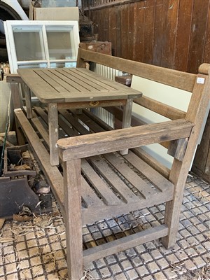 Lot 420 - A teak garden table by Lister and a teak...