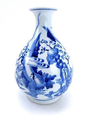 Lot 174 - A Chinese blue and white porcelain bottle vase, 17th century style.