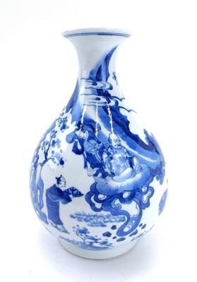 Lot 174 - A Chinese blue and white porcelain bottle vase, 17th century style.