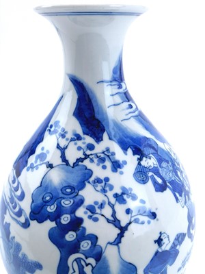Lot 174 - A Chinese blue and white porcelain bottle vase, 17th century style.