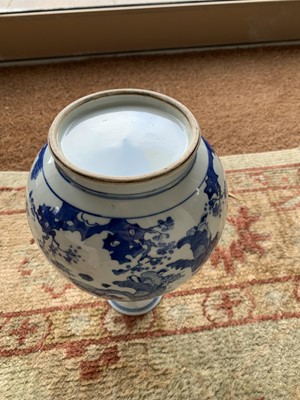 Lot 174 - A Chinese blue and white porcelain bottle vase, 17th century style.