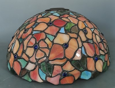 Lot 21 - A Tiffany style leaded glass light shade. The...