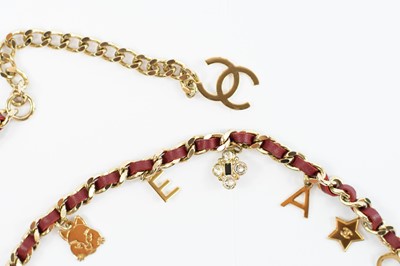 Lot 403 - Chanel belt. Champagne gold plated 'Charms'.