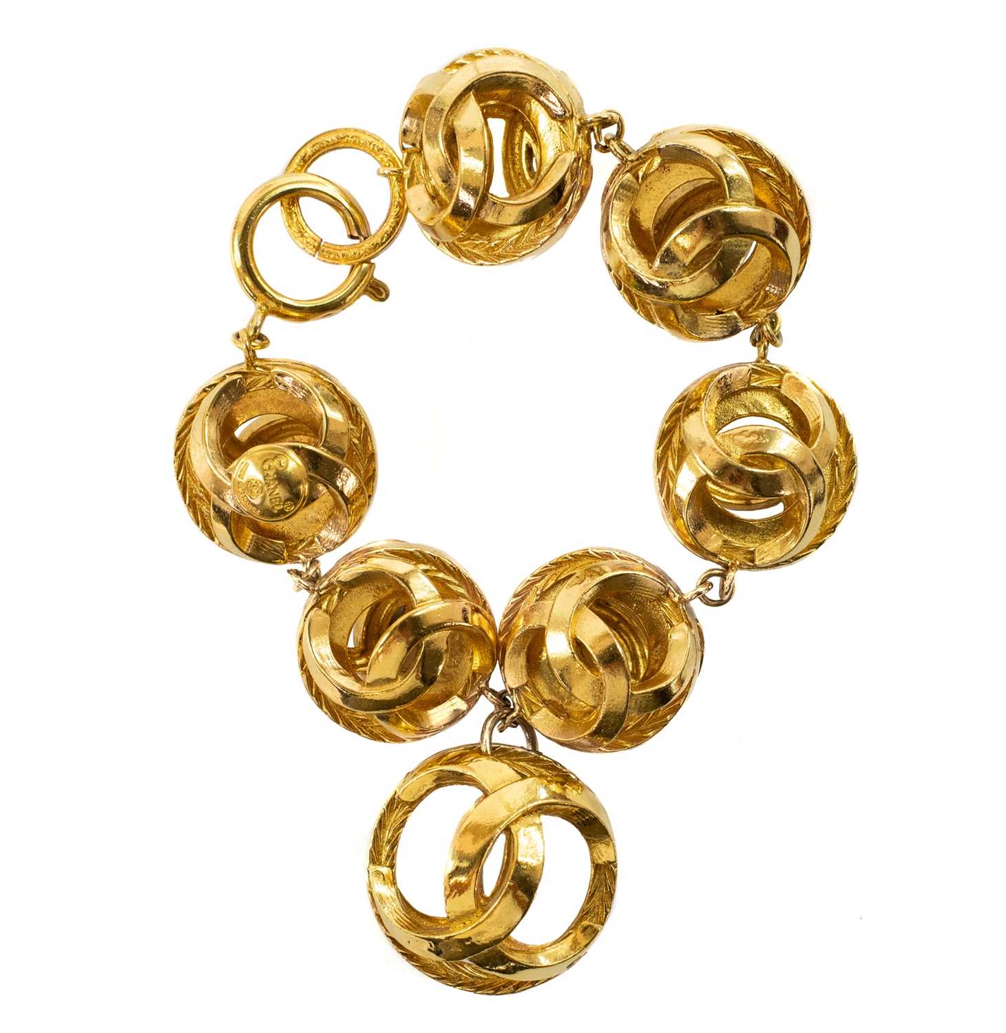 Lot 401 - Chanel gold plated bracelet. Interlocking CC ovoid design.