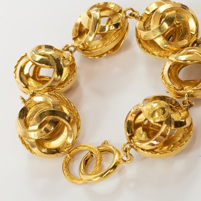 Lot 401 - Chanel gold plated bracelet. Interlocking CC ovoid design.