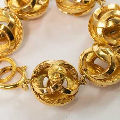 Lot 401 - Chanel gold plated bracelet. Interlocking CC ovoid design.