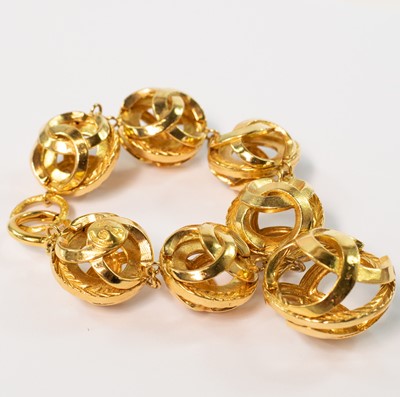 Lot 401 - Chanel gold plated bracelet. Interlocking CC ovoid design.