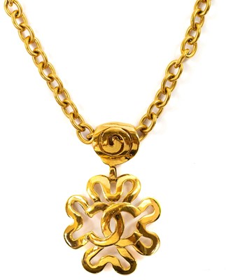 Lot 402 - Chanel gold plated pendant necklace. CC Spring Flower design.