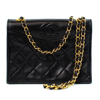 Lot 383 - A Chanel Mini Full Flap handbag in black quilted lambskin with gold tone hardware.