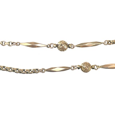 Lot 65 - A Victorian 9ct rose gold belcher, foliate engraved ball and facet barrel necklace.