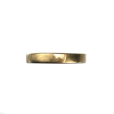Lot 152 - A high purity gold (tests 18ct) band ring.