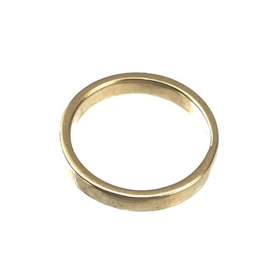Lot 152 - A high purity gold (tests 18ct) band ring.