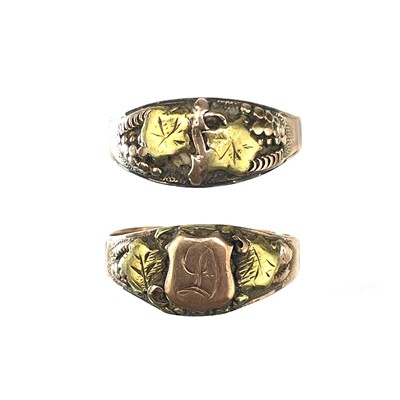 Lot 180 - Two 19th century American bi-colour gold rings.
