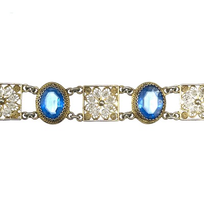 Lot 210 - An 800 silver gilt blue stone set bracelet