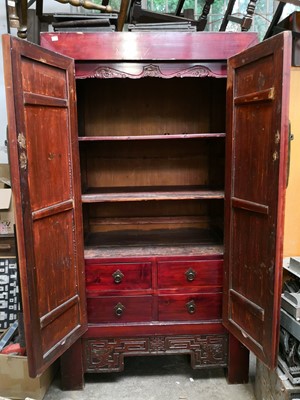 Lot 58 - A Korean dark elm wardrobe.