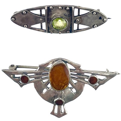 Lot 170 - A Secessionist silver and amber coloured enamel brooch in the style of Theodor Fahrner.