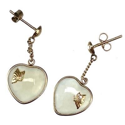 Lot 213 - A pair of gold mounted heart shaped celadon jade drop stud earrings.