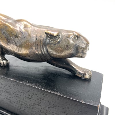 Lot 9 - An Art Deco bronze model of a prowling panther,...