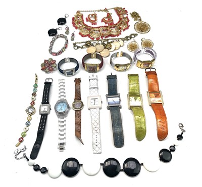 Lot 392 - A collection of Joan Rivers fashion quartz wristwatches and costume jewellery.