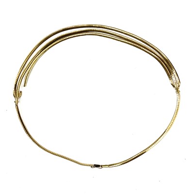 Lot 13 - An 8ct gold matt textured omega link triple strand necklace