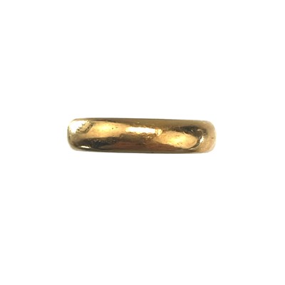 Lot 153 - A 22ct gold heavy band ring, Birmingham 1930.