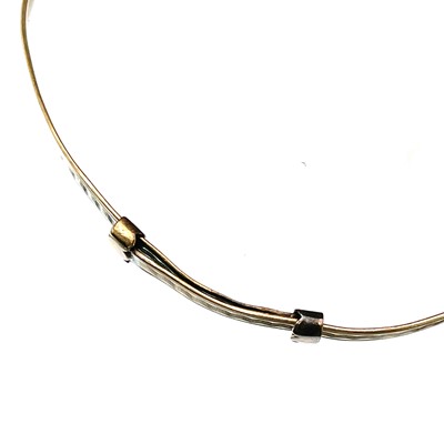 Lot 61 - A 9ct gold adjustable bangle and a broken 9ct chain.