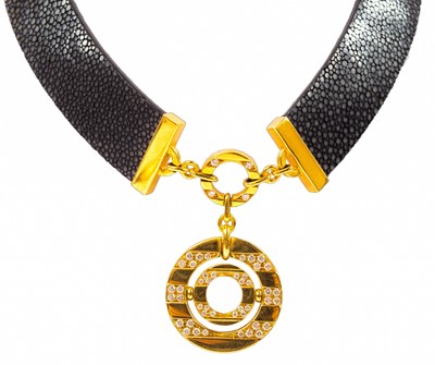 Lot 397 - Bulgari – An 18ct gold diamond set pendant necklace.