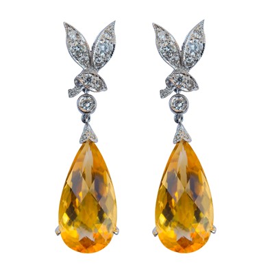 Lot 194 - A pair of 18ct white gold, citrine and diamond drop earrings.