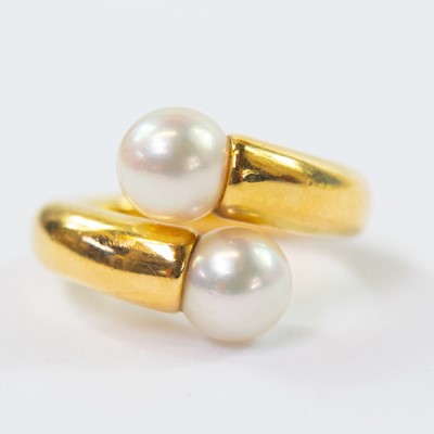 Lot 398 - Cartier - An 18ct gold cultured pearl set ring.