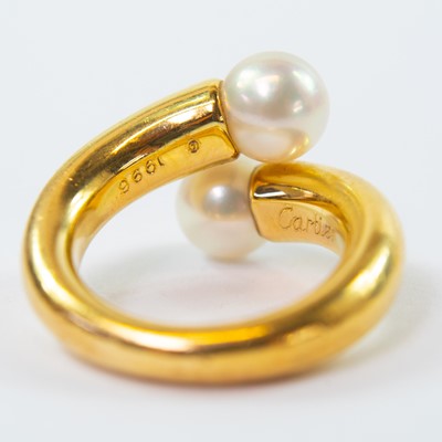 Lot 398 - Cartier - An 18ct gold cultured pearl set ring.
