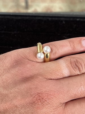 Lot 398 - Cartier - An 18ct gold cultured pearl set ring.