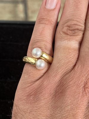 Lot 398 - Cartier - An 18ct gold cultured pearl set ring.