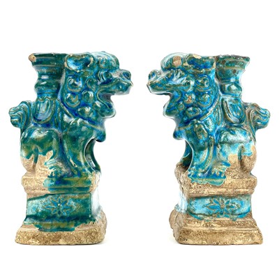 Lot 263 - A pair of Chinese pottery turquoise glazed incense holders.