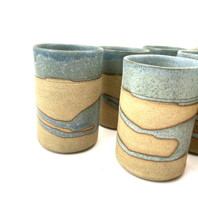 Lot 835 - Alan Brough, A set of six cylindrical beakers,...