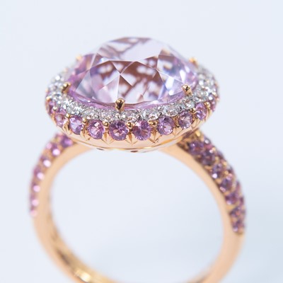 Lot 191 - A contemporary 18ct rose gold kunzite and diamond set cluster ring.