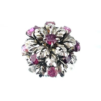 Lot 86 - A 9ct (tested) white gold ruby set dress ring.